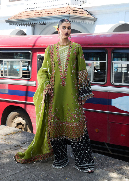 Model wearing Hussain Rehar Luxury Lawn '25 Abass in olive green with intricate embroidery. Shop Pakistani luxury pret online in the UK.