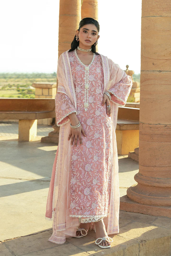 Model wearing Mushq Saugaat City of Lights Areej in soft pink with delicate embroidery and embellishments. Shop Pakistani luxury pret online in the UK.