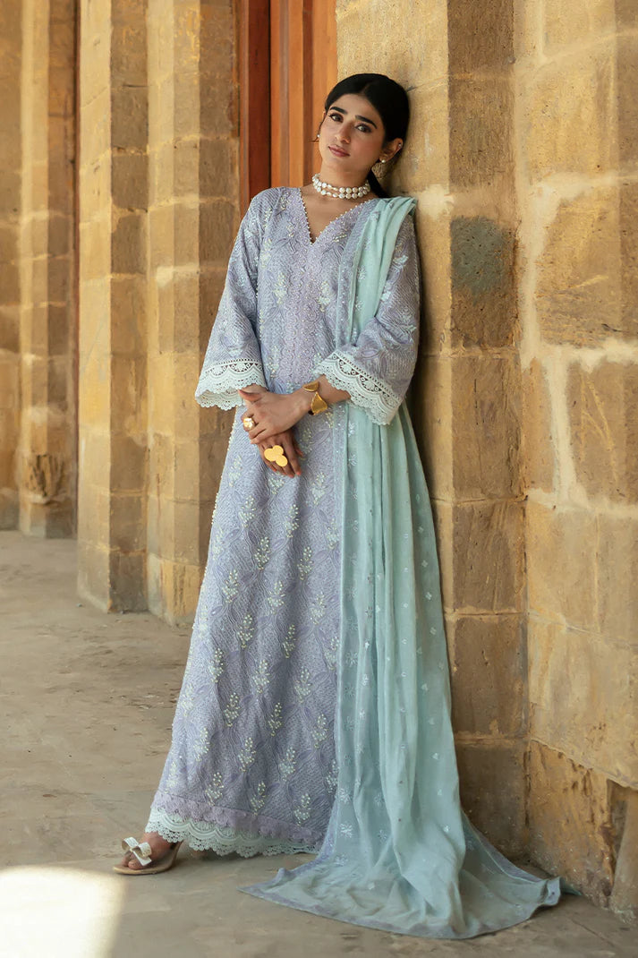 Model wearing Mushq Saugaat City of Lights Mahpara in soft lavender with mint dupatta and lace details. Shop Pakistani luxury pret online in the UK.