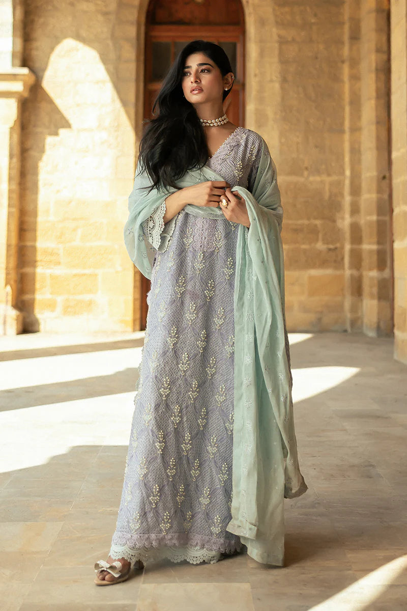 Model wearing Mushq Saugaat City of Lights Mahpara in soft lavender with mint dupatta and lace details. Shop Pakistani luxury pret online in the UK.