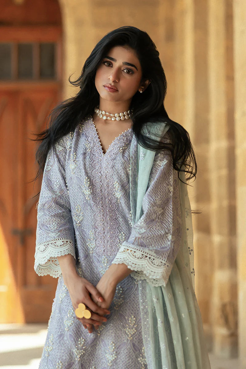 Model wearing Mushq Saugaat City of Lights Mahpara in soft lavender with mint dupatta and lace details. Shop Pakistani luxury pret online in the UK.