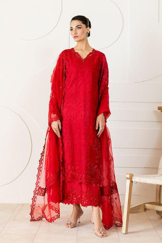 Model wearing deep red Rubea dress from Mushq, featuring intricate embroidery for Pakistani luxury pret and Pakistani clothes online in UK.