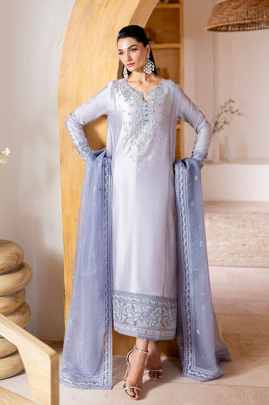 Model wearing lilac Elya dress from Mushq with hand-embellished details, perfect for Pakistani luxury pret and Pakistani clothes online in UK.