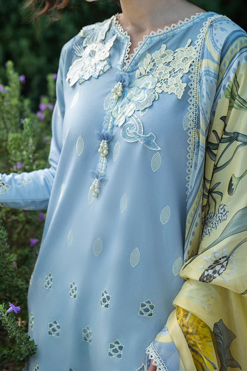 Model wearing powder blue Intesa dress from Mushq Solace Ombre Chikankari, Pakistani Luxury pret, Sana Safinaz style, Pakistani clothes online in UK.