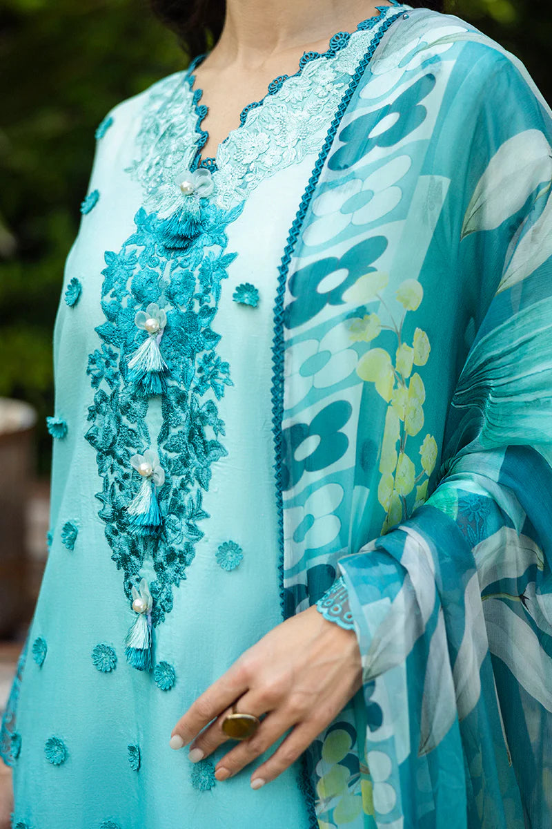 Model wearing ombre turquoise blue Amore dress from Mushq Solace Ombre Chikankari, Pakistani Luxury pret, Pakistani clothes online in UK.
