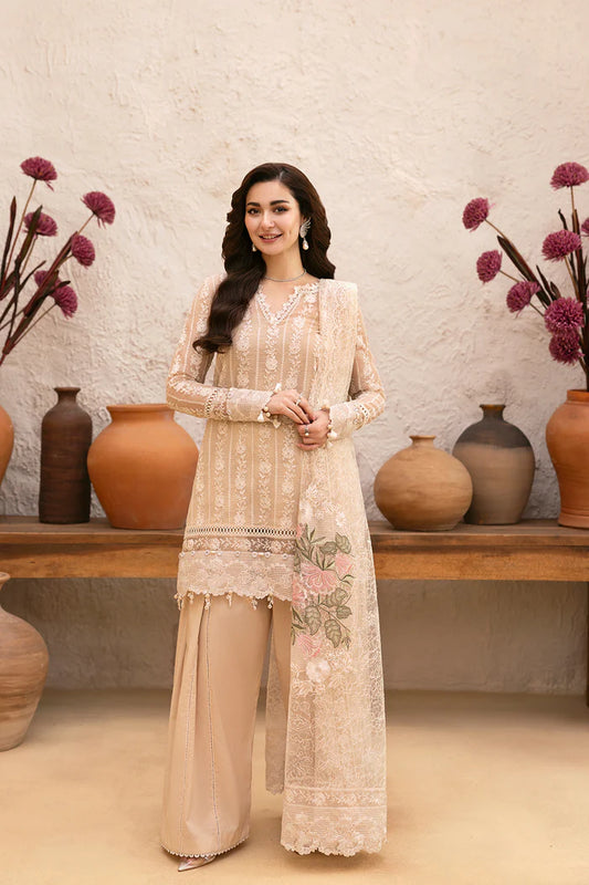 Model wearing beige embroidered shirt with lace detailing and matching floral dupatta from Saira Rizwan, Pakistani luxury pret, Pakistani clothes online in UK.