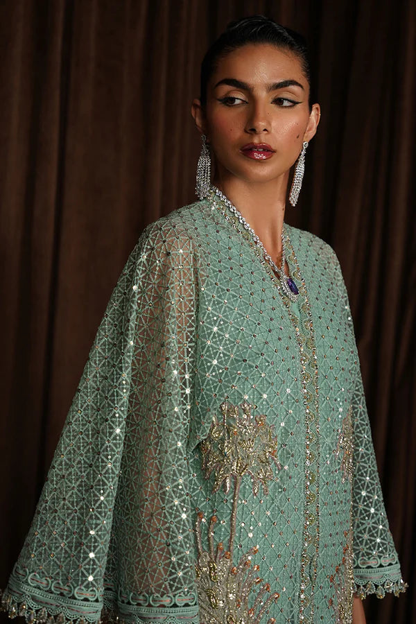 Model wearing Suffuse Luxury Pret '24 LIVIA Aqua Front Open Kaftan. Pakistani clothes online in UK.