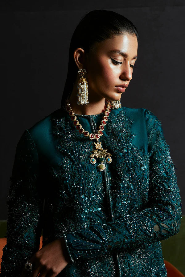 Model wearing Suffuse's JASMINE dress, a luxurious addition to Luxury Pret '24. Pakistani clothes online in UK.