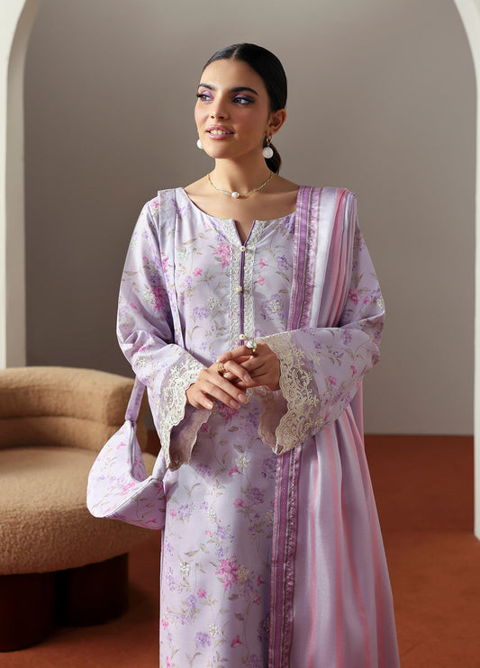 Model wearing Quince from Gulaal in a soft lavender printed co-ord set with lace detailing and striped dupatta, perfect for Pakistani luxury pret in the UK.