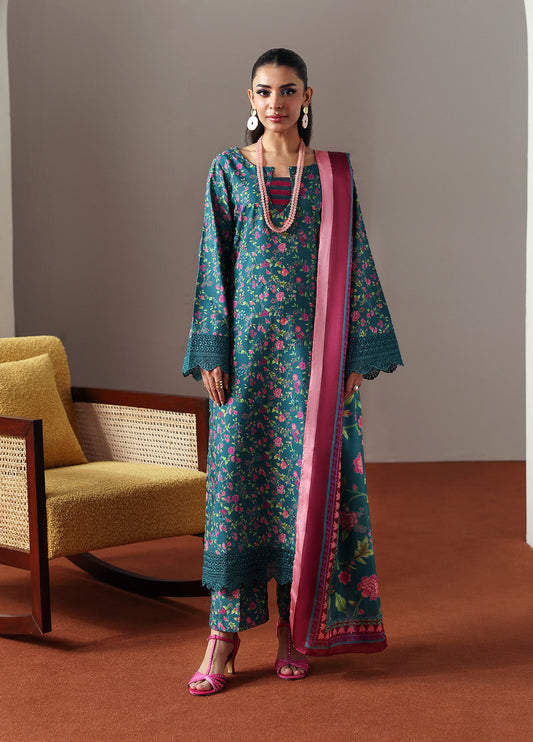 Model wearing Zeirin from Gulaal in a teal green floral printed co-ord set with pink dupatta, ideal for Pakistani luxury pret in the UK.