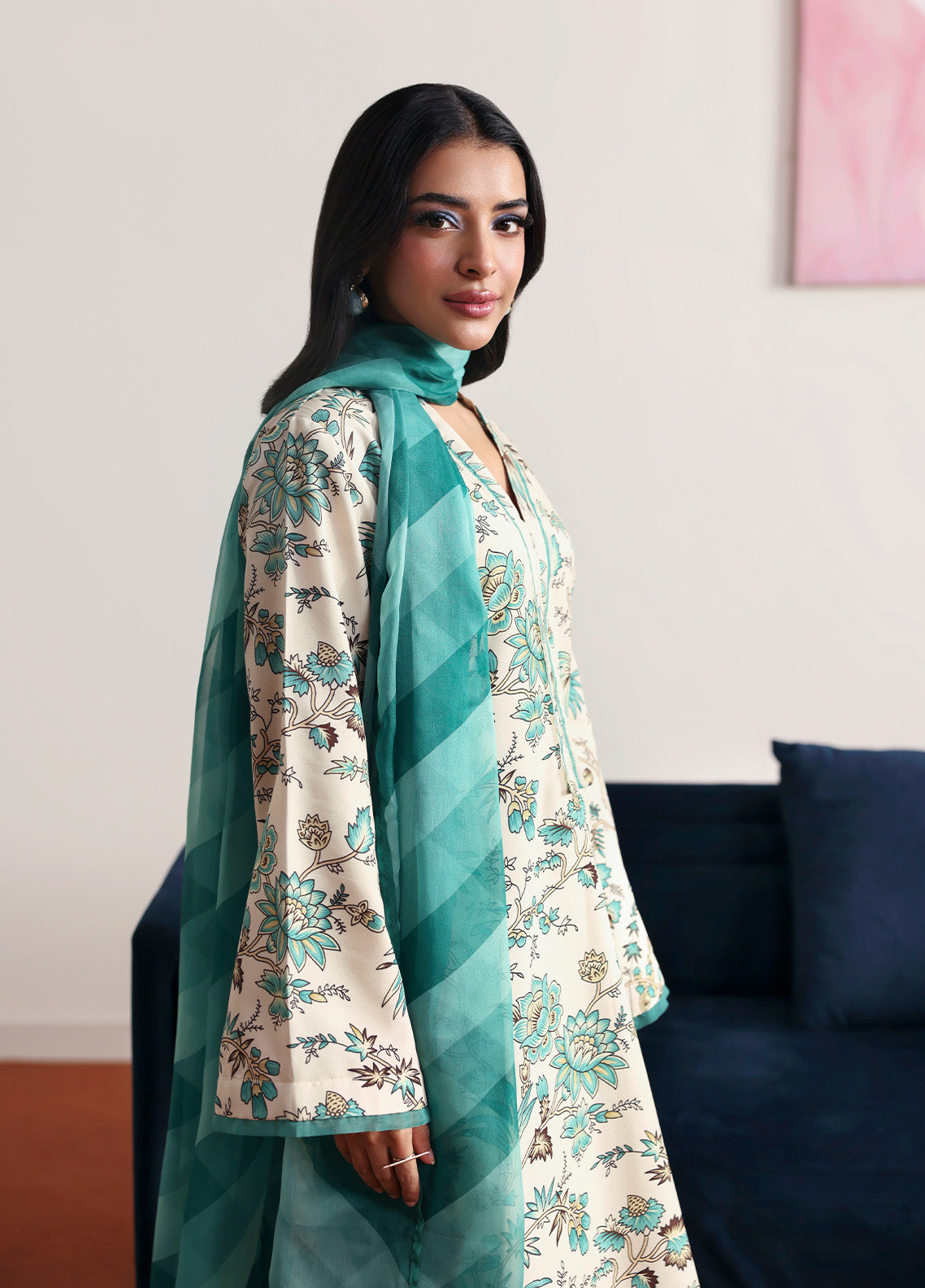 Model wearing meadowe from Gulaal in a beige printed co-ord set with teal floral design and matching dupatta, ideal for Pakistani luxury pret in the UK.