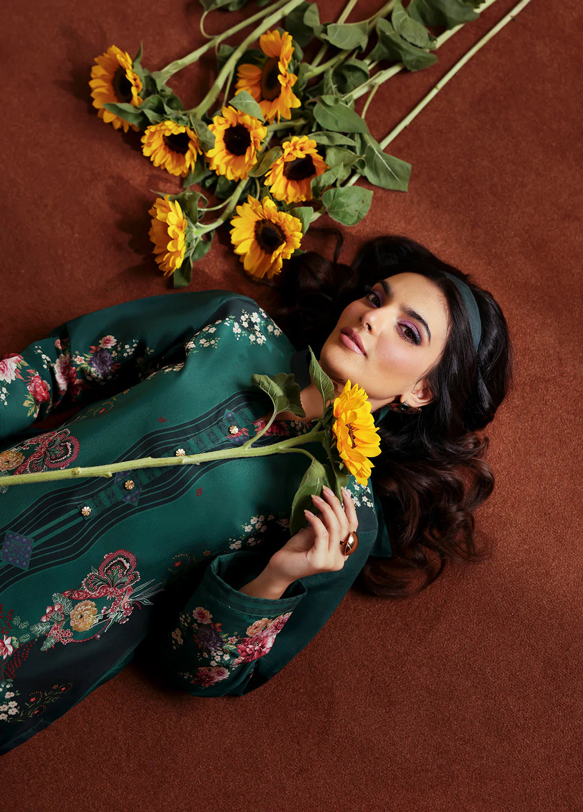 Model wearing Faye by Gulaal in deep green with floral print, a chic Pakistani luxury pret outfit – shop Pakistani clothes online in UK.