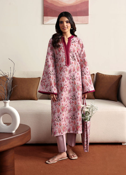 Model wearing pink floral printed outfit from Gulaal Basics | Blossom, Pakistani luxury pret for Pakistani clothes online in UK.