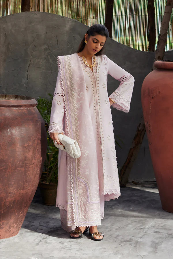 Model wearing Suffuse Fariya dress, a chic addition to Pakistani clothes online in UK. Elegance meets modern flair.