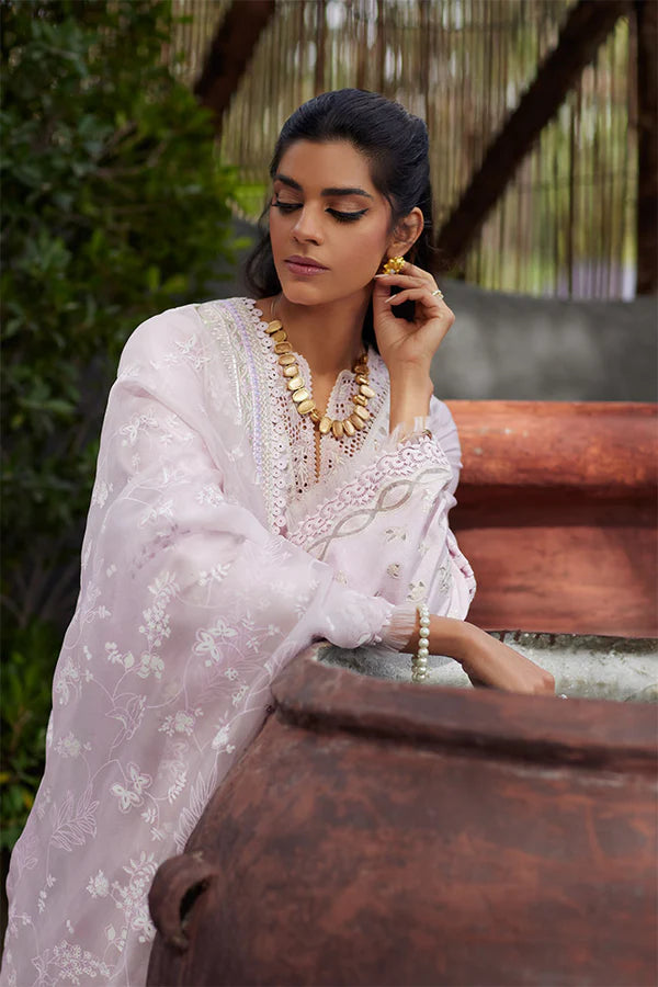 Model wearing Suffuse Fariya dress, a chic addition to Pakistani clothes online in UK. Elegance meets modern flair.