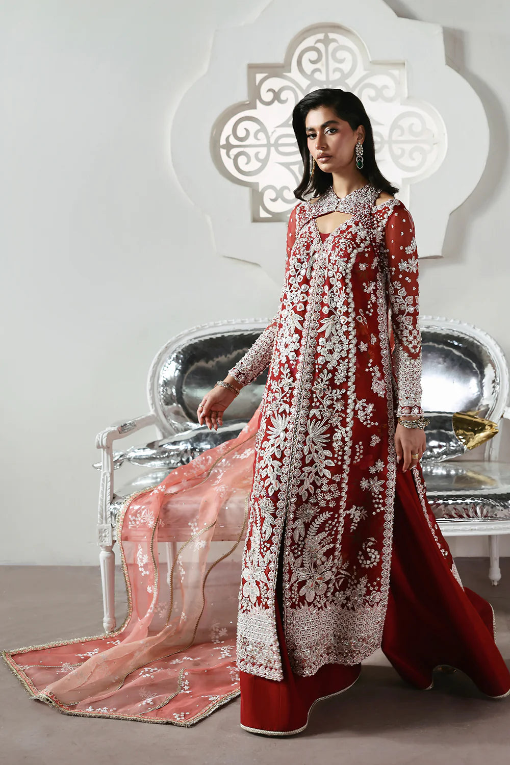 Model wearing Solara by Soraya in deep red with heavy white embroidery and peach dupatta – Pakistani luxury pret, shop online in UK.
