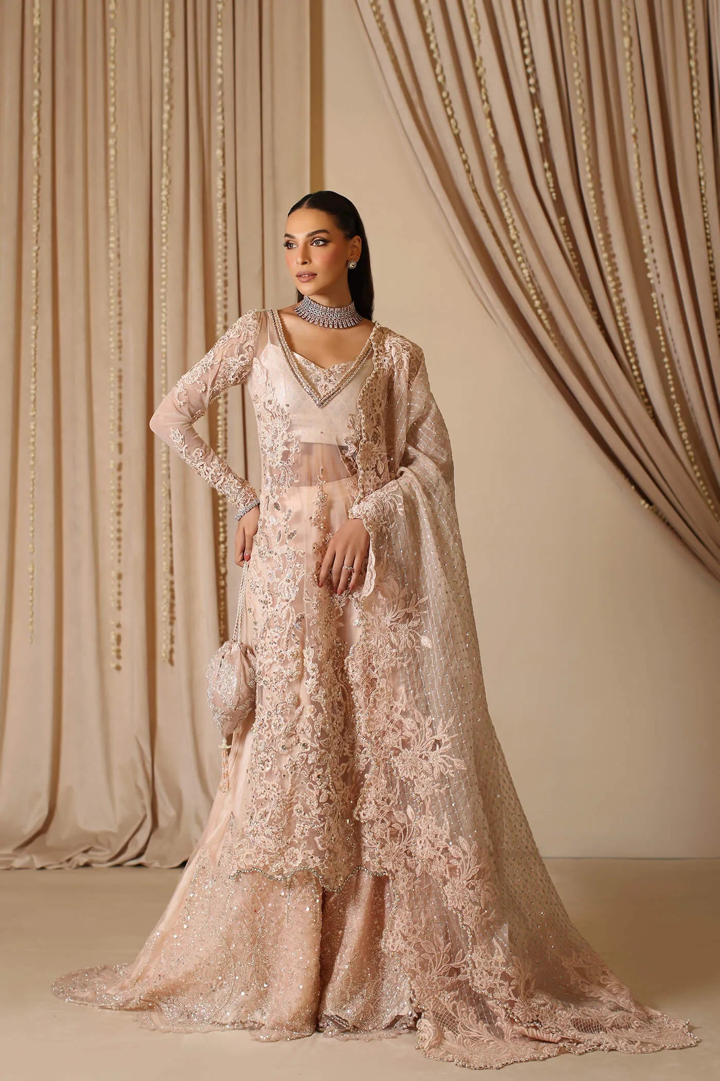 Model wearing The Modern Maharani's MAJESTIC FANTASY, an equisite mold by Musferah Saad UK, Pakistani Clothes UK.