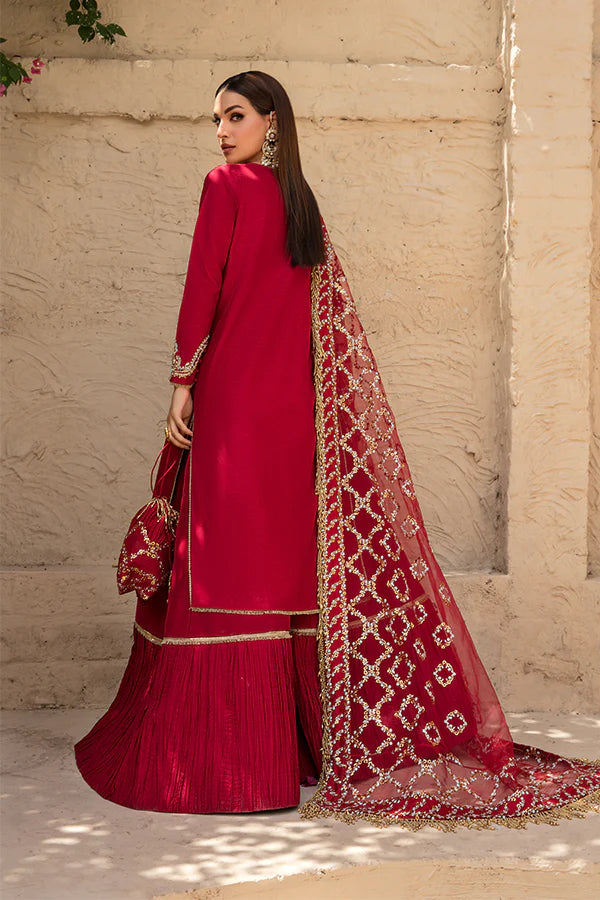 Model wearing Saffron Perissa Rose Gold Satin dress, showcasing Pakistani clothes online in UK.