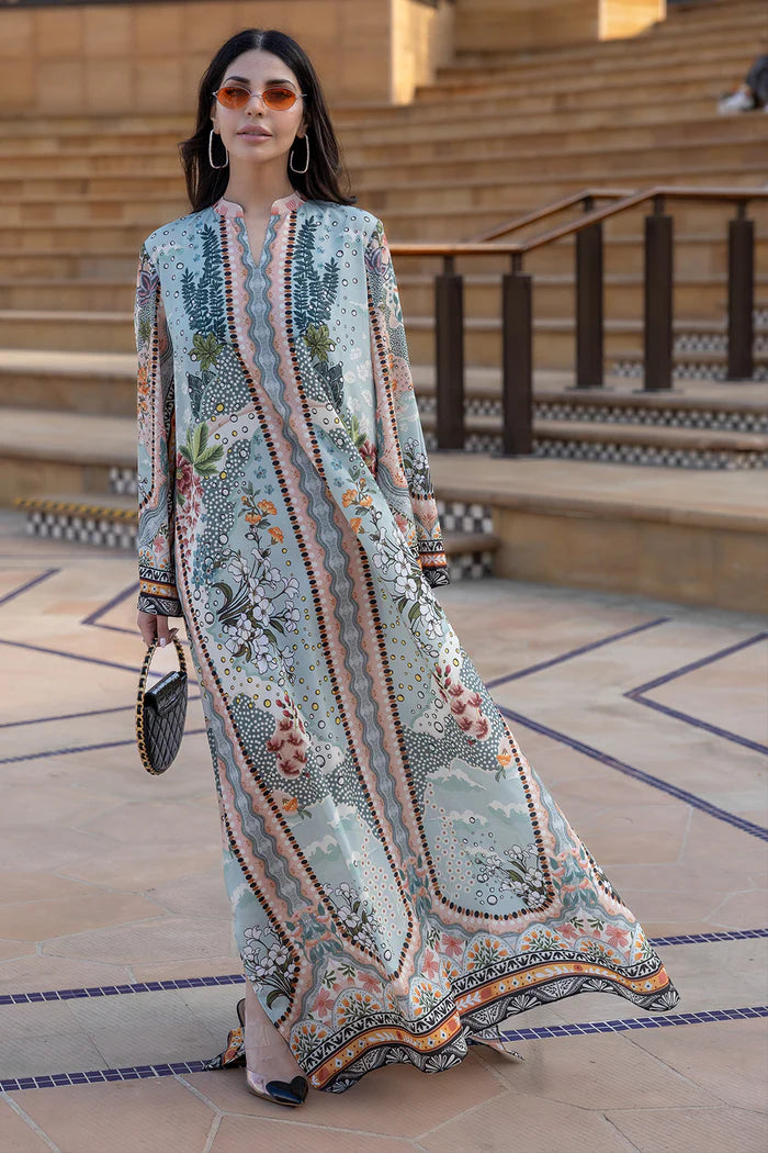 Model wearing multicolour printed long kaftan-style dress with flared sleeves from Saira Rizwan, Pakistani luxury pret, Pakistani clothes online in UK.