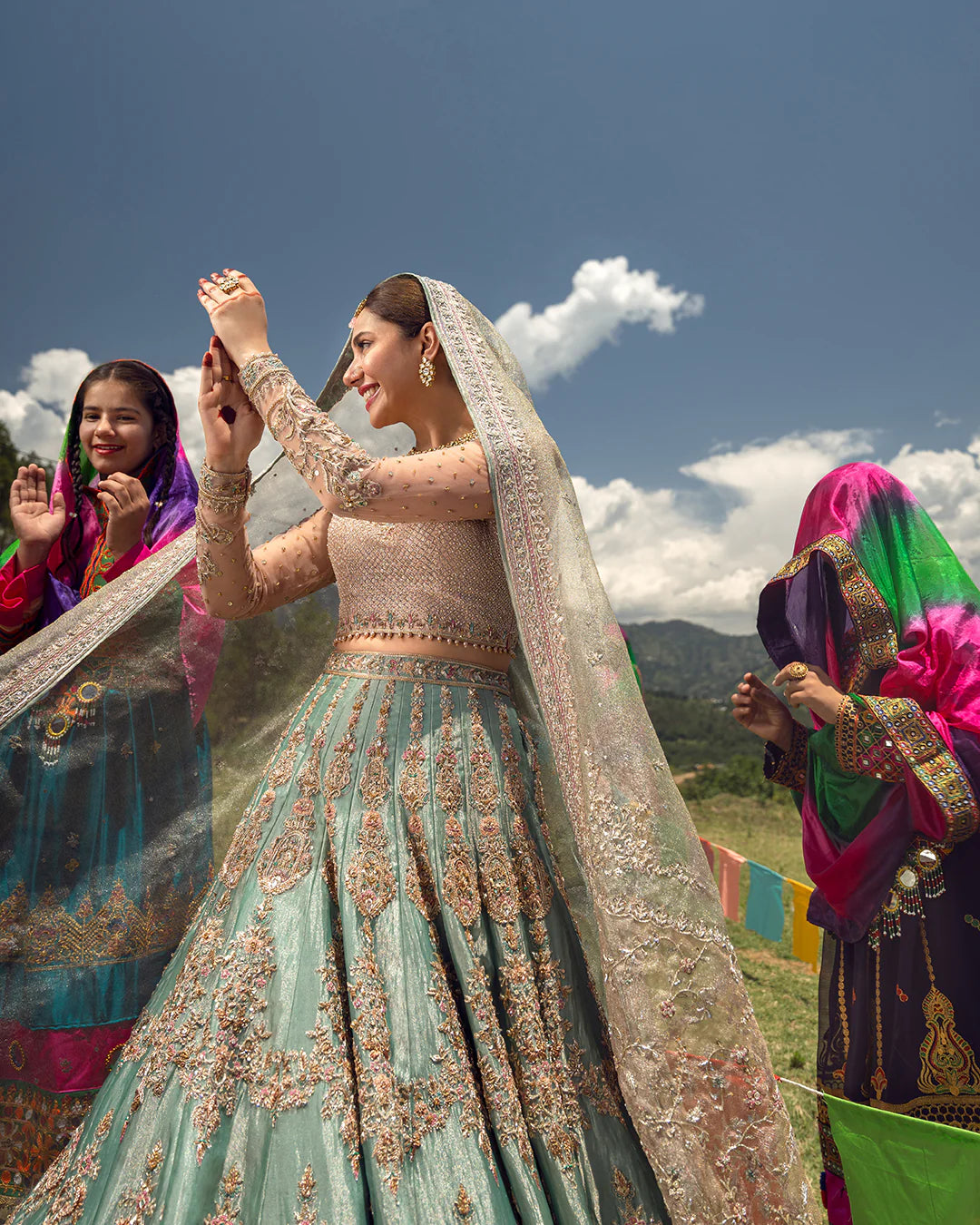 Model wearing mint green Mahro dress by Faiza Saqlain, Pakistani luxury pret online in UK, perfect for festive occasions.