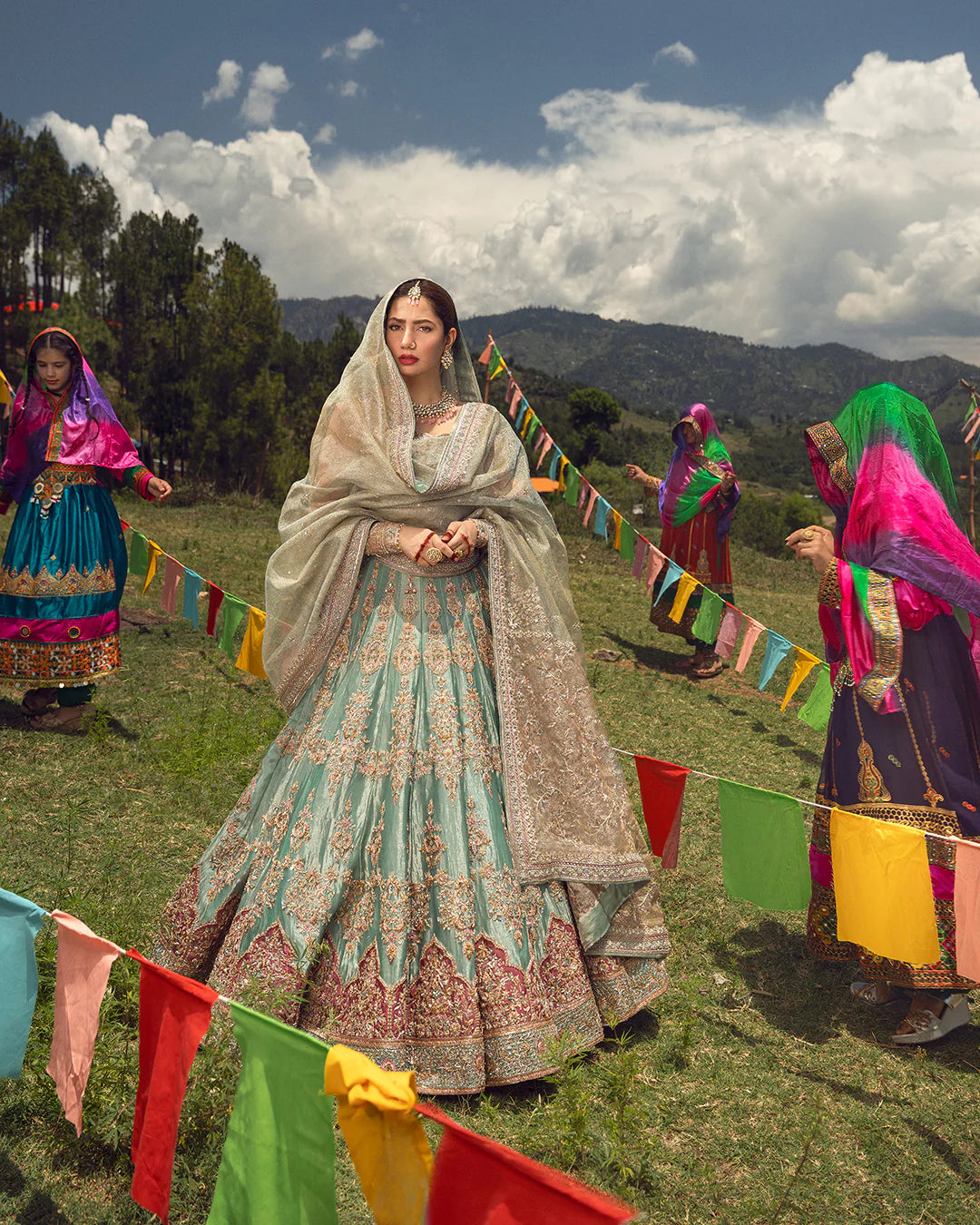 Model wearing mint green Mahro dress by Faiza Saqlain, Pakistani luxury pret online in UK, perfect for festive occasions.