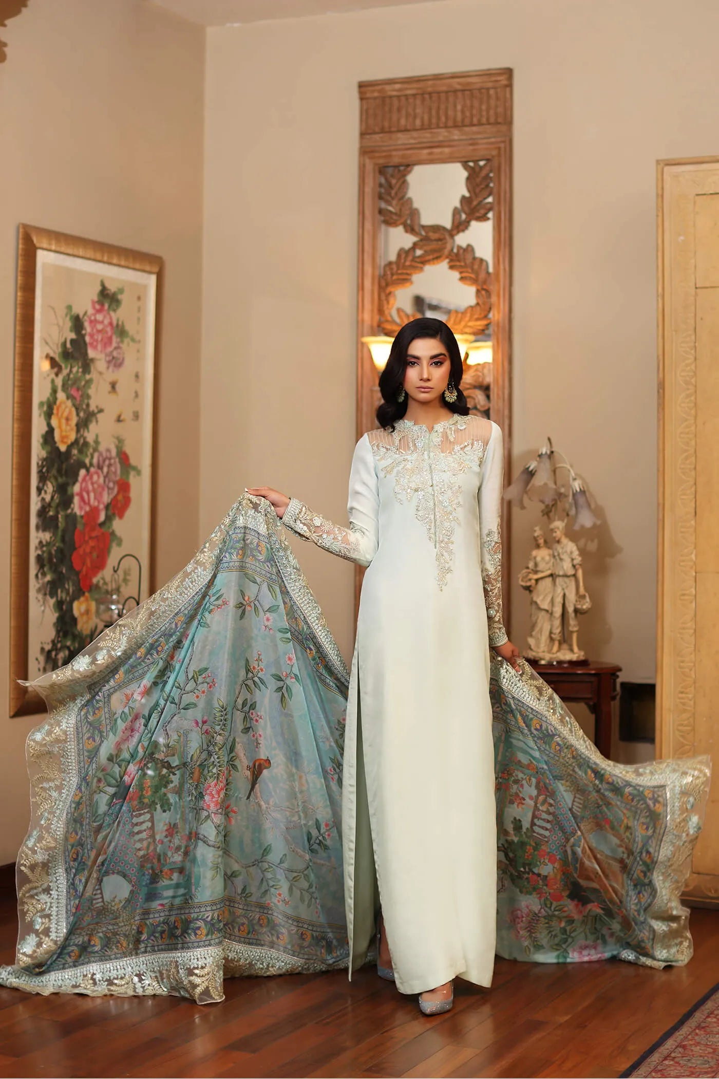 Model wearing a light blue AZURE dress from Musferah Saad's ENCHANTE Eid collection '24, showcasing Pakistani clothes online in the UK.