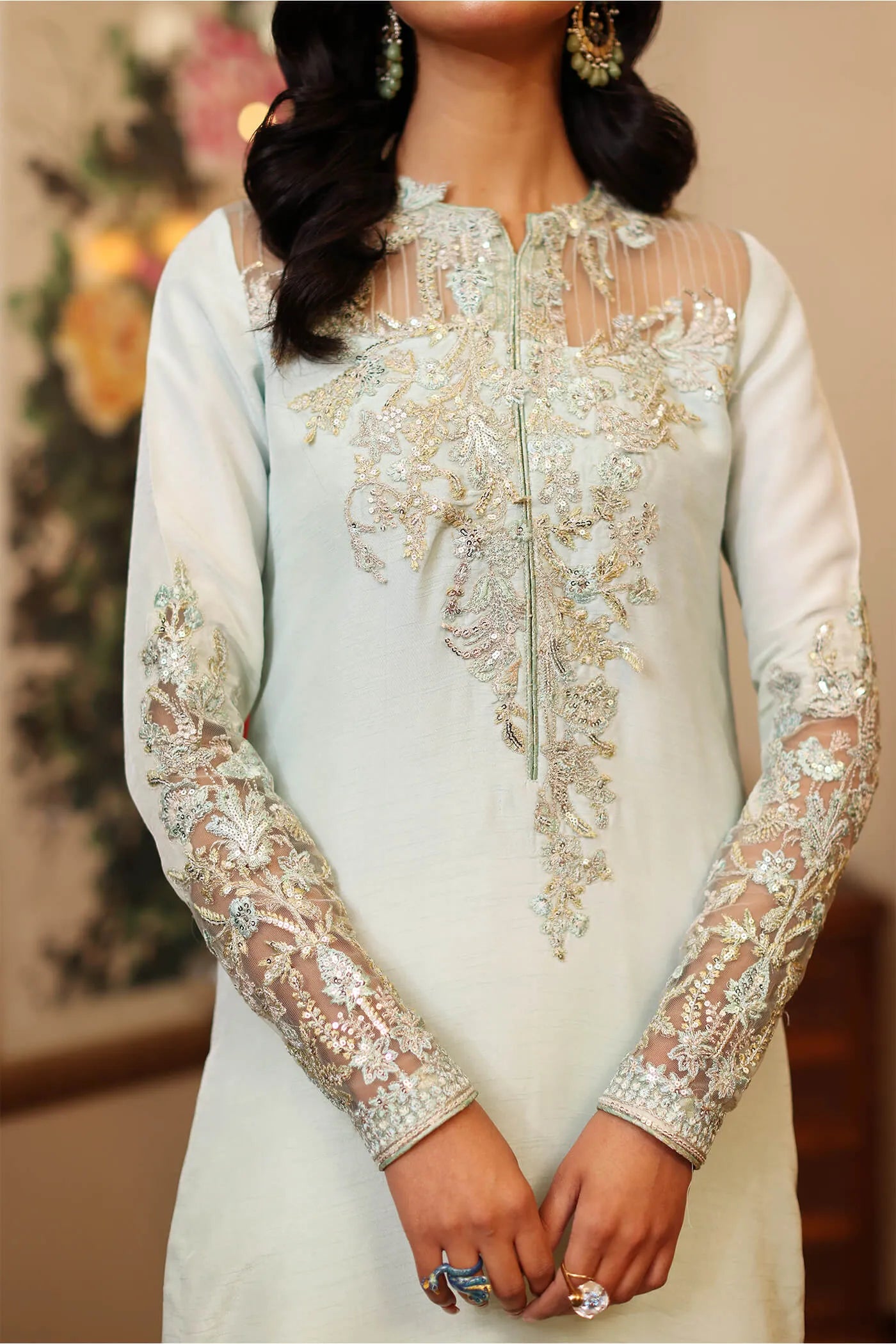 Model wearing a light blue AZURE dress from Musferah Saad's ENCHANTE Eid collection '24, showcasing Pakistani clothes online in the UK.