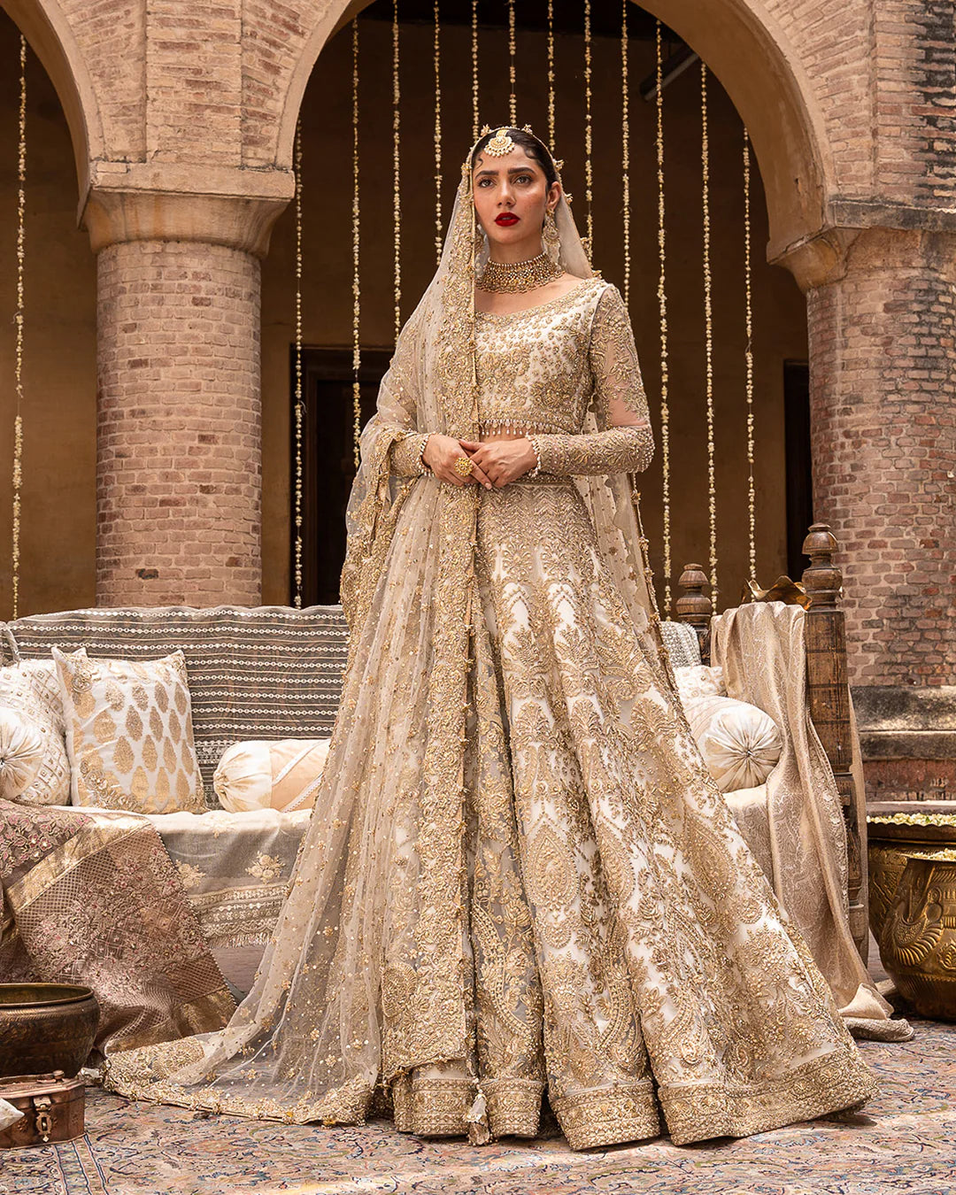 Model wearing cream and gold bridal dress Gelin by Faiza Saqlain, Pakistani luxury pret online in UK for wedding events.