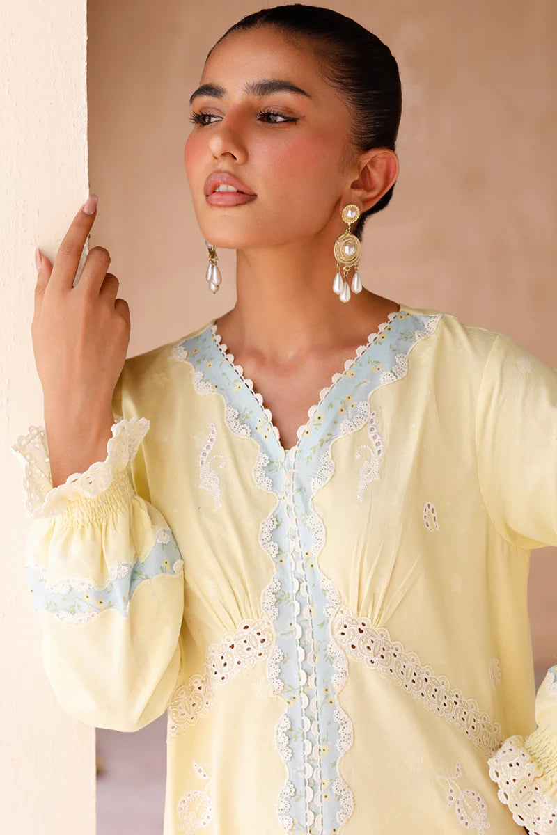 Model wearing yellow embroidered coords EP-10 Elin from Qalamkar, Pakistani luxury pret available online in UK.