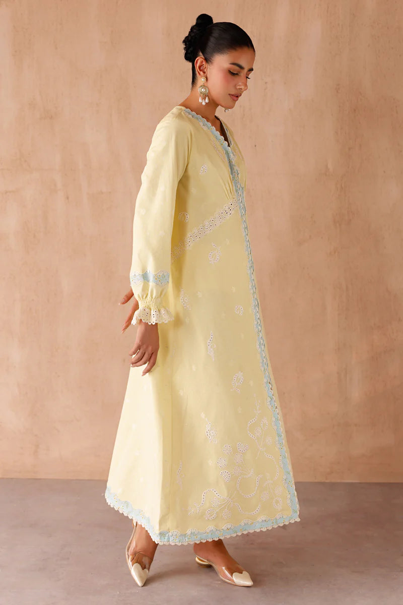 Model wearing yellow embroidered coords EP-10 Elin from Qalamkar, Pakistani luxury pret available online in UK.