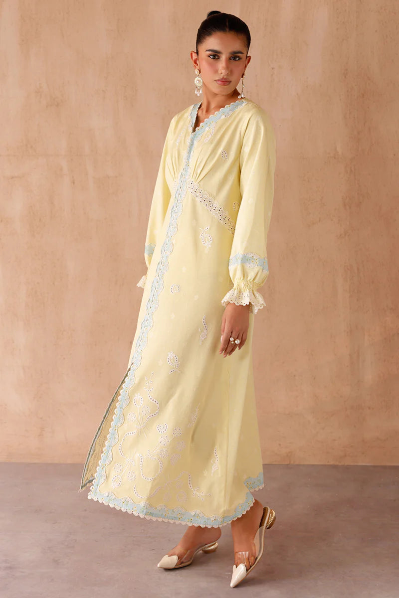 Model wearing yellow embroidered coords EP-10 Elin from Qalamkar, Pakistani luxury pret available online in UK.