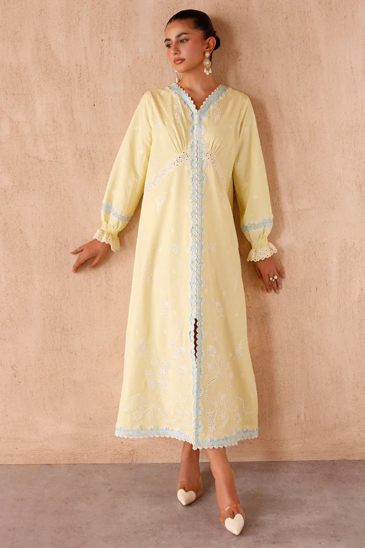 Model wearing yellow embroidered coords EP-10 Elin from Qalamkar, Pakistani luxury pret available online in UK.