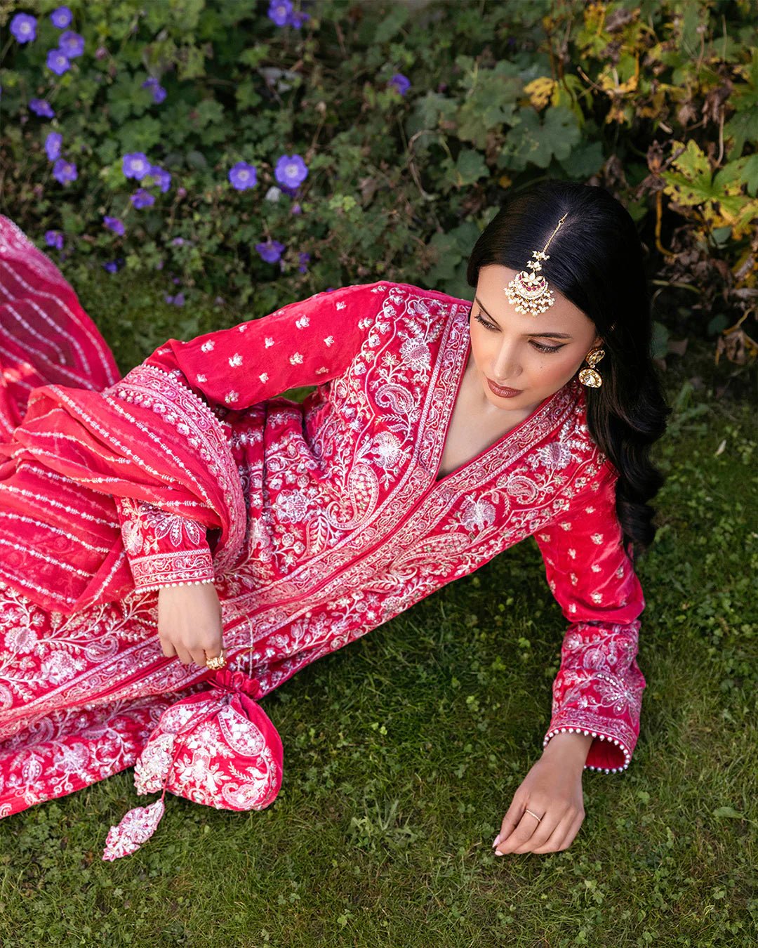 Model wearing Alannah from Faiza Saqlain's Adeen Velvet '24 collection in rich maroon. Luxury pret, festive, Pakistani clothes online in UK.