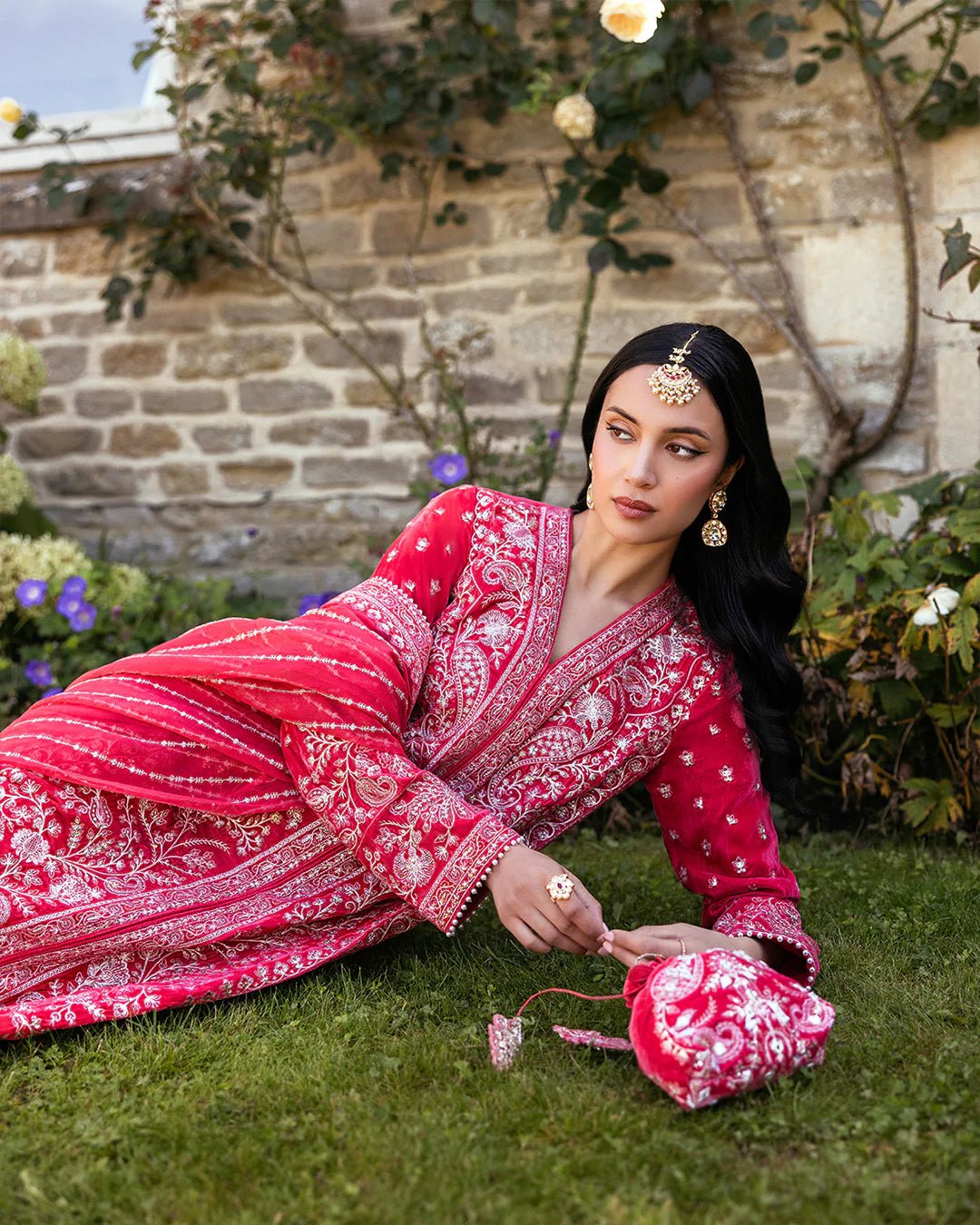 Model wearing Alannah from Faiza Saqlain's Adeen Velvet '24 collection in rich maroon. Luxury pret, festive, Pakistani clothes online in UK.