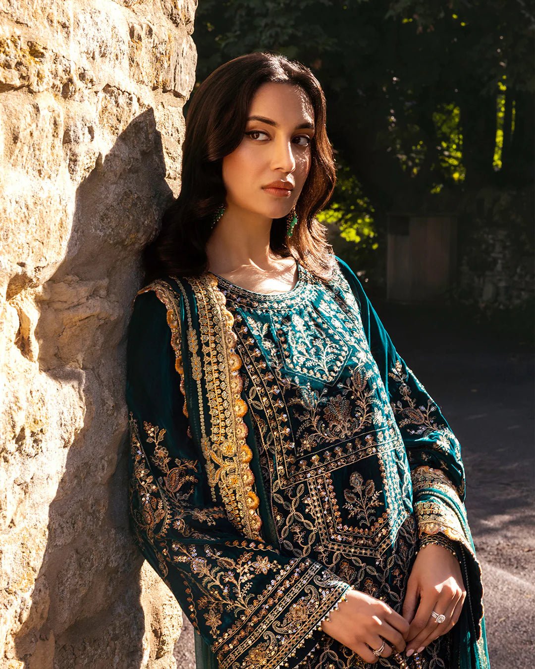 Model wearing Merna from Faiza Saqlain's Adeen Velvet '24 collection in teal green. Luxury pret, festive, Pakistani clothes online in UK.