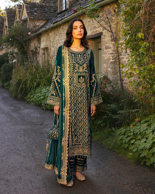 Model wearing Merna from Faiza Saqlain's Adeen Velvet '24 collection in teal green. Luxury pret, festive, Pakistani clothes online in UK.