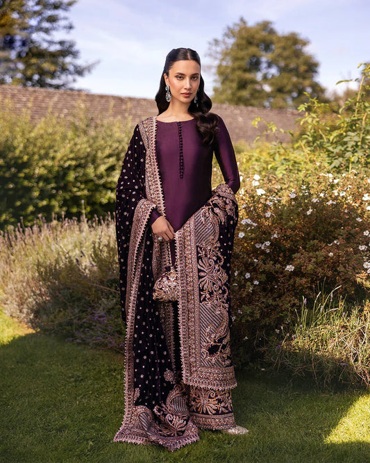 Model wearing Vespera from Faiza Saqlain's Adeen Velvet '24 collection in rich navy blue. Luxury pret, festive, Pakistani clothes online in UK.