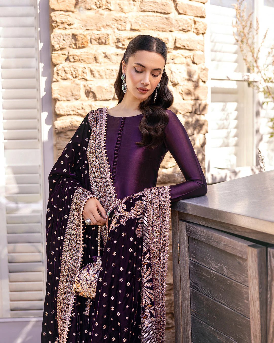 Model wearing Vespera from Faiza Saqlain's Adeen Velvet '24 collection in rich navy blue. Luxury pret, festive, Pakistani clothes online in UK.