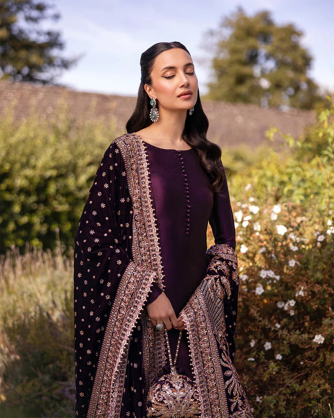 Model wearing Vespera from Faiza Saqlain's Adeen Velvet '24 collection in rich navy blue. Luxury pret, festive, Pakistani clothes online in UK.