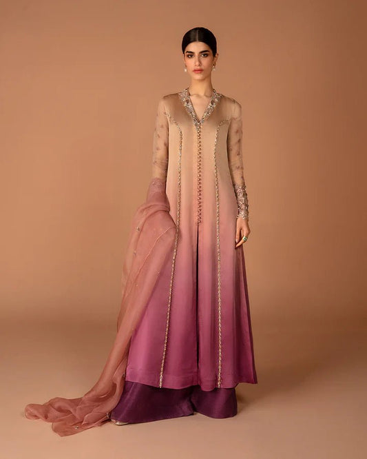 Model wearing a purple Eshe dress from Faiza Saqlain's Aleira Evening Edit '24 collection. Pakistani clothes online in UK.