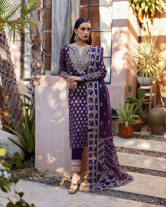 Model wearing a purple Clara dress from Faiza Saqlain's Lenora Luxury Pret '24 collection. Pakistani clothes online in UK.