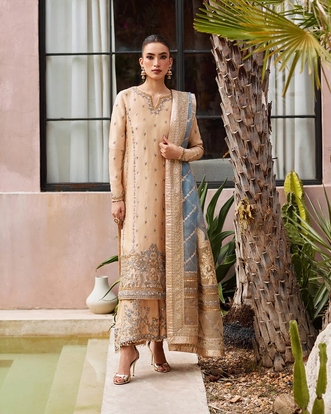 Model in Faiza Saqlain UK Yelena dress, Aurnia Spring 2024, chic Pakistani fashion.