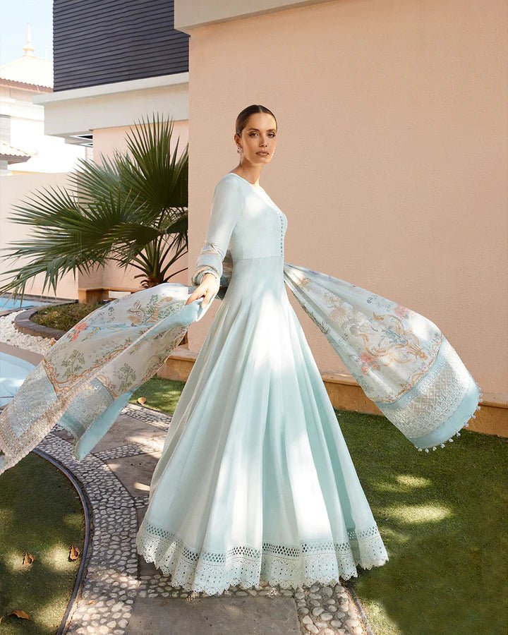 Model wearing a sky blue Latissa dress from Faiza Saqlain, featuring delicate embroidery. Ideal for showcasing Pakistani clothes in the UK at Signature Labels