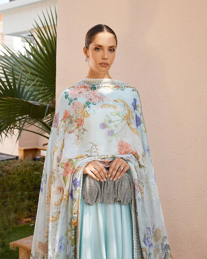 Model wearing a sky blue Latissa dress from Faiza Saqlain, featuring delicate embroidery. Ideal for showcasing Pakistani clothes in the UK at Signature Labels