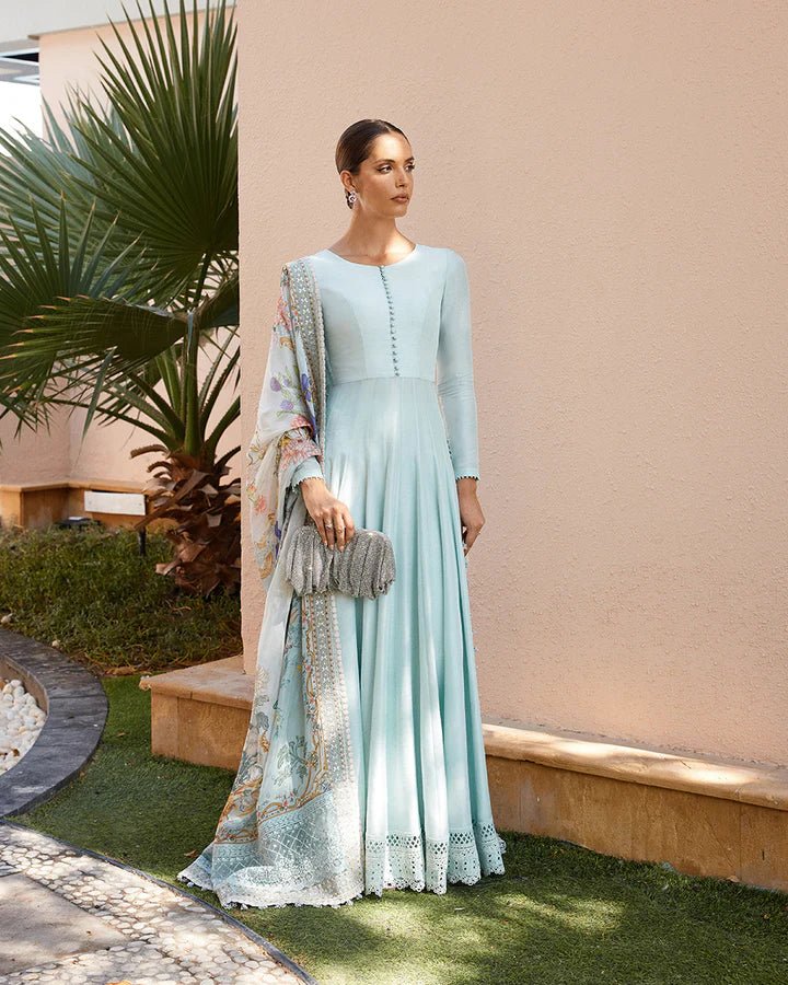 Model wearing a sky blue Latissa dress from Faiza Saqlain, featuring delicate embroidery. Ideal for showcasing Pakistani clothes in the UK at Signature Labels