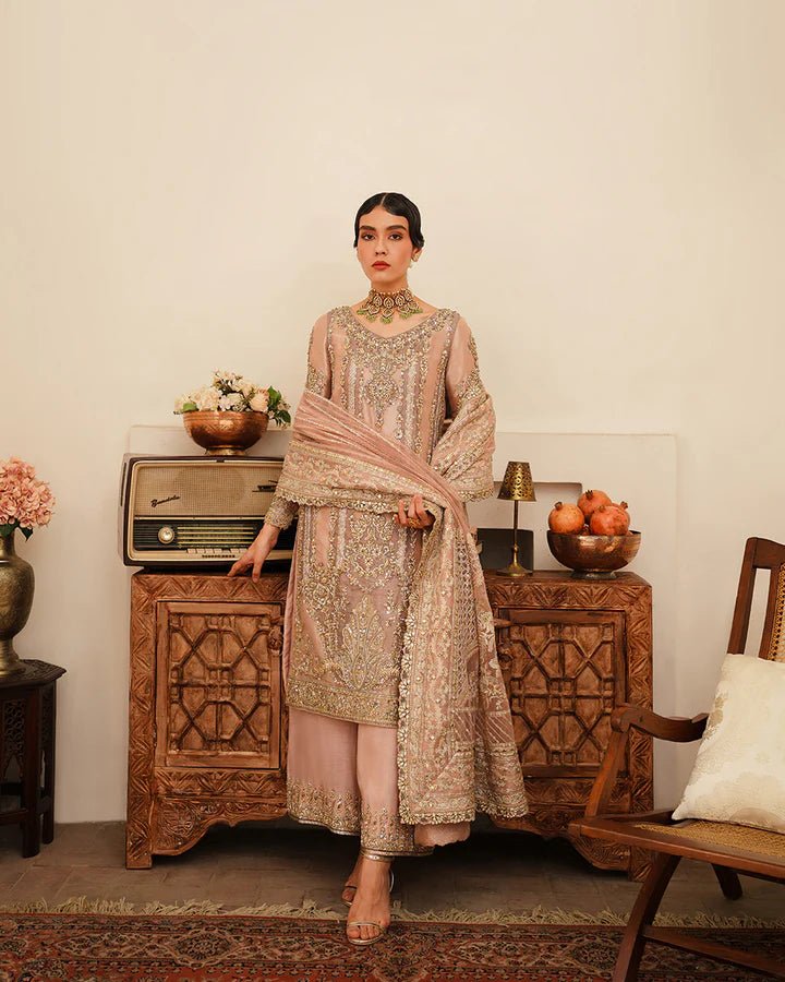 Model wearing Faiza Saqlain Formals Irina Oct '23 Astur dress in Tea pink, Pakistani clothes online in UK.