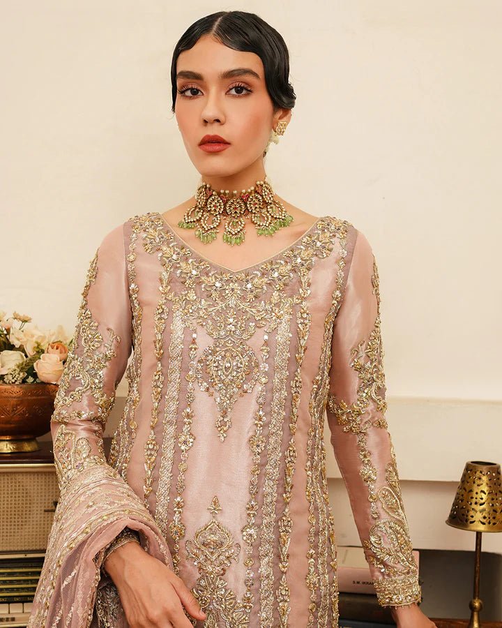 Model wearing Faiza Saqlain Formals Irina Oct '23 Astur dress in Tea pink, Pakistani clothes online in UK.