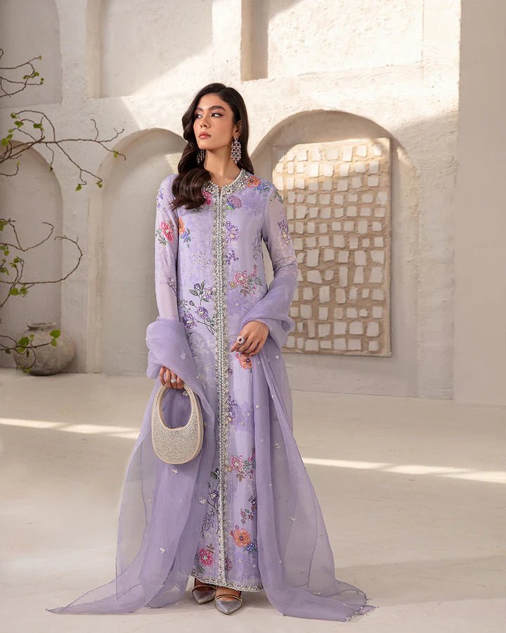 Model wearing a lavender Aria dress with intricate floral embroidery from Faiza Saqlain's Lenora Luxury Pret '24 collection. Pakistani clothes online in UK.