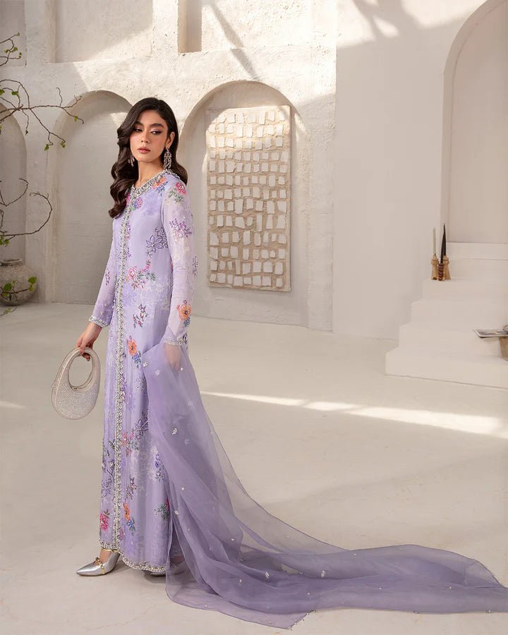 Model wearing a lavender Aria dress with intricate floral embroidery from Faiza Saqlain's Lenora Luxury Pret '24 collection. Pakistani clothes online in UK.