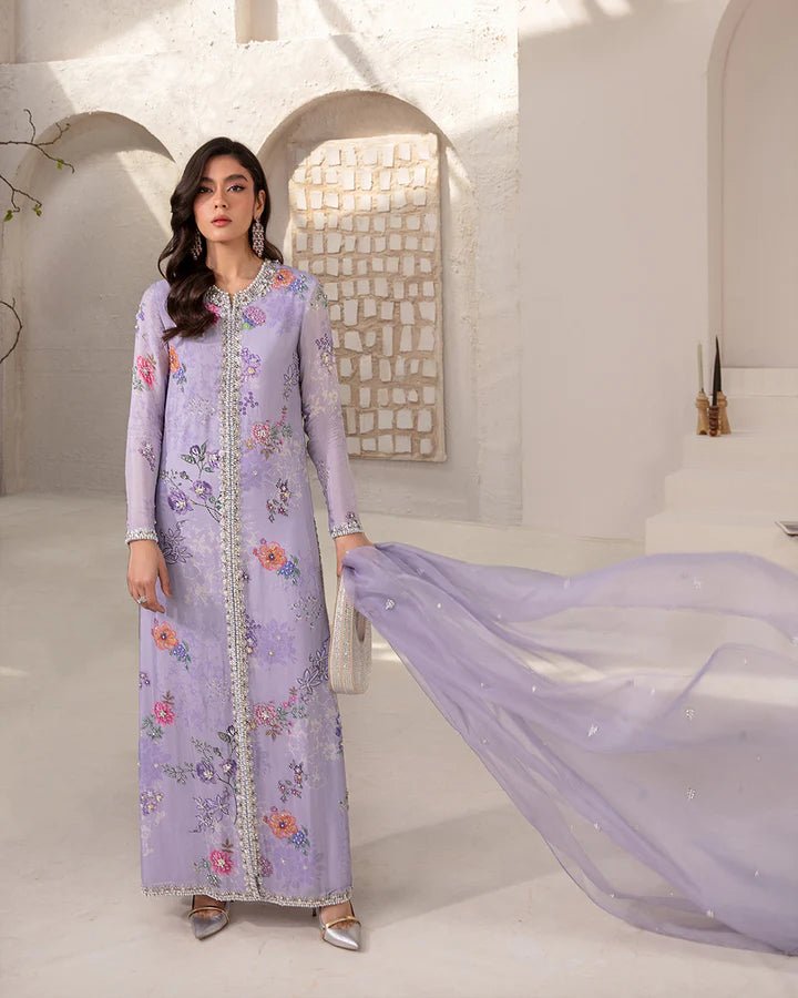 model wearing Faiza Saqlain Aria, lavender Pakistani wedding dress with floral accents in UK